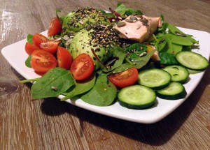 Cucumber, tomato, spinach, lambs lettuce, mange tout, avocado, furikake (sesame and seaweeds), pumpkin seeds, and finally steamed salmon, all drizzled with flaxseed oil... now that's what I call breakfast!